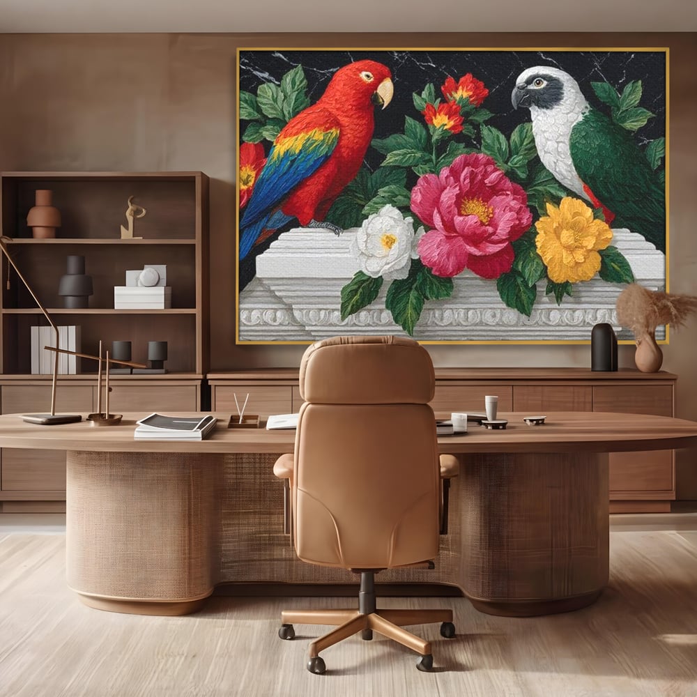 Tablou canvas cu pictura cu papagali si flori, in rama de aluminiu auriu, pe perete intr-un birou